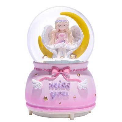 China Factory Direct Selling Artificial Water Ball Custom Wholesale Children's Gifts Resin Snow Globe Music Box Crystal Ball for sale