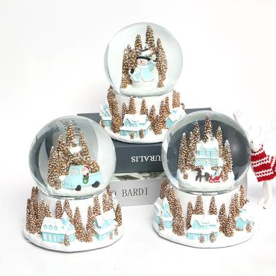 China Artificial Custom Resin Open Water Glass Balls Wholesale Christmas Gifts Crystal Ball Musical Box Snow globe for sale