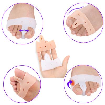 China Durable foot alignment silicone gel foot care products gel toe separator hallux valgus toe retractor for sale