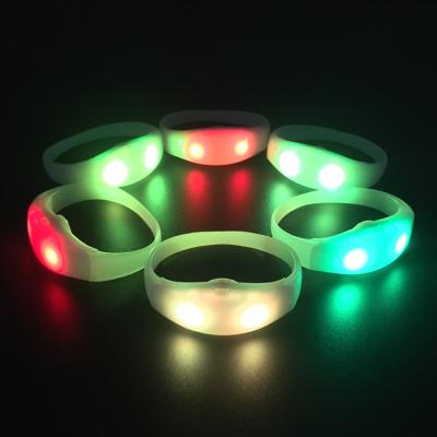 China Concert Party Events 2022 Sound Control Led High Quality Party Giveaways Wristband Silicone Flashlight Custom Logo LED Band Flashing Wristband for sale