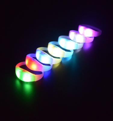 China Logo Cycling Night Glowing Multi Color LED Events Party Concert Light Up Custom Wristbands for sale