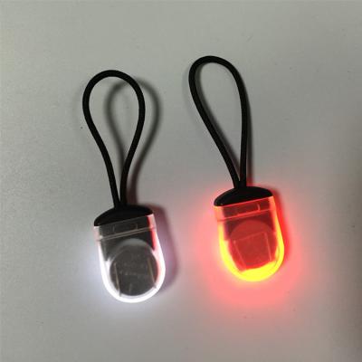 China Custom Led Backpack Mini Led Zipper Light Safety Warning Light Plastic+Electronic Components Warning Mini Led Flashing Zipper Light for sale