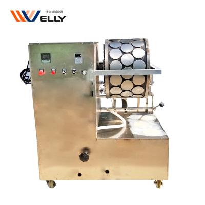 China Automatic Electric Type Dumpling Hotels Gas Heating Skin Making Machine Spring Roll Wrapping Machine Price for sale