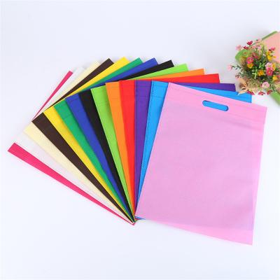 China Eco Friendly Custom Handled Logo Handled Style And Die Cut Handle Nonwoven Material Fair D Non Woven Cut Bag for sale