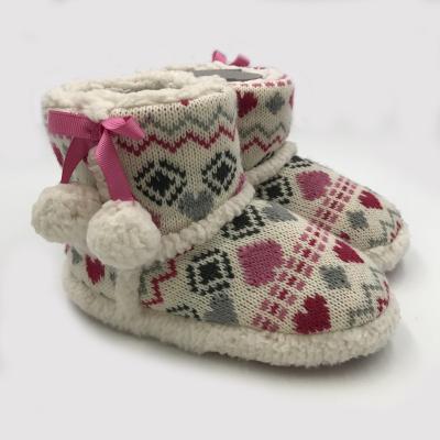 China Thermal Kids Slip On Crochet Heart Embroidery Knitted Pom Pom Boot Slippers With Soles for sale