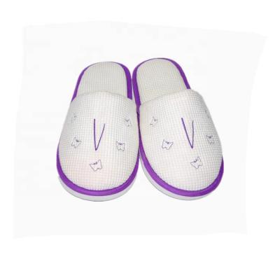 China Lightweight Cheap Custom Logo Eva Outsole Disposable Hotel Slippers for sale