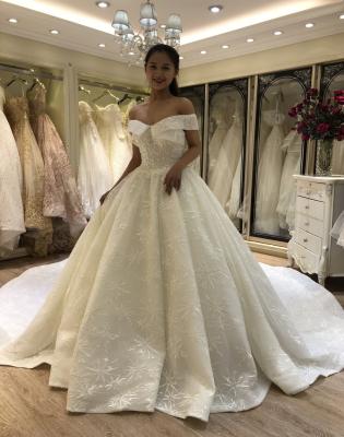 China 2021 Breathable Off-Shoulder Ball Gown Princess Wedding Dress Ivory Color for sale