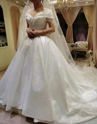 China 2021 Breathable Real Sample Off The Shoulder Chapel Train Wedding Dress Bling Bling Bridal Gown Wedding Dress for sale