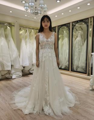 China Elegant Anti-Static Backless V Neck Wedding Dress 2021 Wedding Dress A Line Women for sale