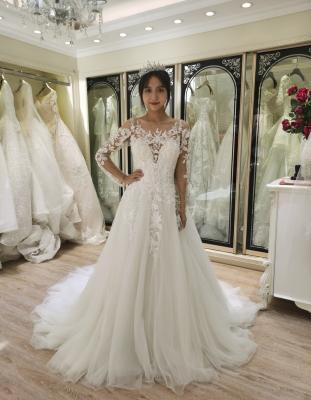 China Breathable 2021 A Line Boat Neck Long Sleeve Wedding Dress Romantic Wedding Dress for sale