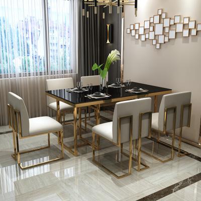 China Adjustable Luxury Modern Restaurant Color (Other) Titanium Stainless Steel Low Dining Table With Tempering Glass Top for sale