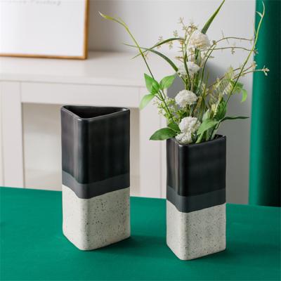 China New Product Custom Minimalist Black Matte Spotted Design Flower Vases Home Decor Porcelain Vase for sale