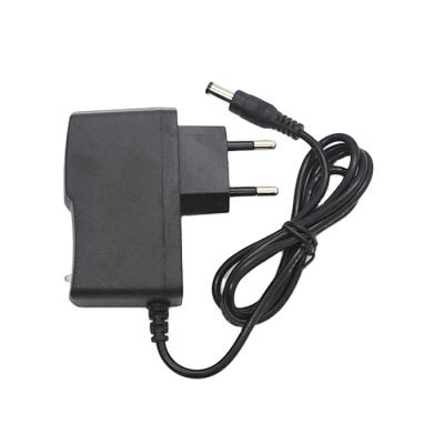 China UniversalÂ   Universal Power Adapter DC to AC Adapter 12.6v1000ma 12.6V 1A Lithium Battery Change Charger for sale