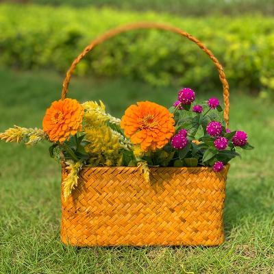 China Viable Handmade Sea Rattan Wicker Baskets Round Seaweed Flower Pot Series Seaweed Flower Pot Pink Color for sale