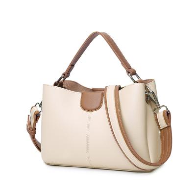 China 2022 cheap ladies beige stylish handbag leather handles high quality retro large capacity bags women handbags high quality about 8 days for sale