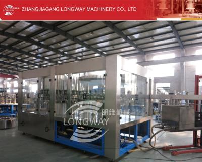 China Zhangjiagang rotary monobloc filling machine / portable water filling machine sleeve labeling machine,shrink packer for sale