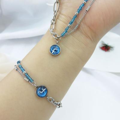 China Lead Free Nickel Free Crystal Blue Ocean Stone Pendant Healing Tree Of Life Necklaces For Jewelry Set for sale