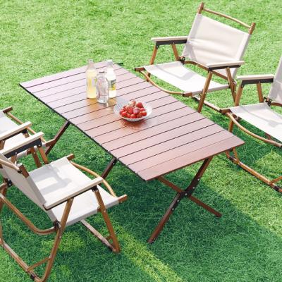 China Easy-carrying Outdoor Wood Grain Metal Picnic Camping Convenient Travel Folding Egg Roll Table and Chair Set for sale