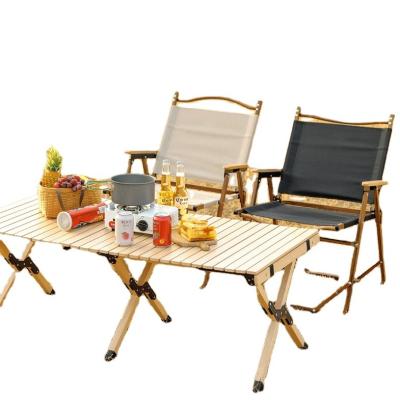 China Easy-carrying Outdoor Travel Folding Picnic Table Egg Roll Table Wood Color Metal Camping Table and Chair Set for sale