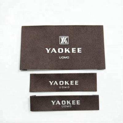 China Garment labels and tags, brand name 100% polyester fabric woven labels for clothing with wash instruction for sale