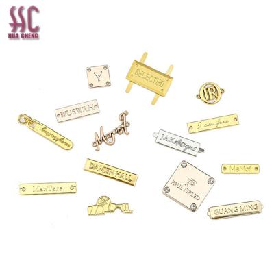 China Wholesale open bag personal clothing metal logo factory mold metal logo label tag zinc alloy custom for sale