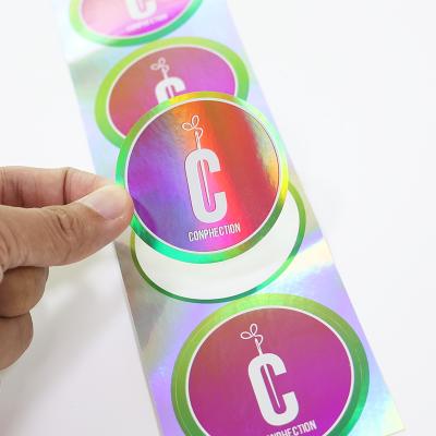 China Transparent Logo Waterproof UV Proof Gold Foil Laser Advertising Die Cut Sheets Mark Advertise Glossy Printed Sticker for sale