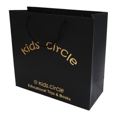 China Custom Black Cardboard Shopping Bag Jewelery Eye Lash Personality Logo Gold Foil Thick Paper Stamping Recyclable for sale