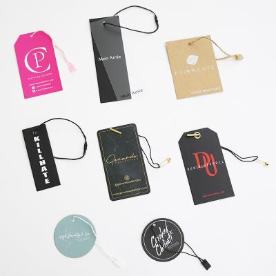 China High Grade Sustainable Custom Garment Tags Blank Handmade Cardboard Black Swing Tickets Clothes Label Garment Paper Hang Tag for sale