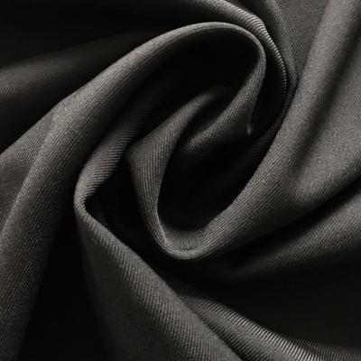 China Cheap stocklot 150D*16 blackout 100% polyester gabardine fabrics for uniform /pants for sale