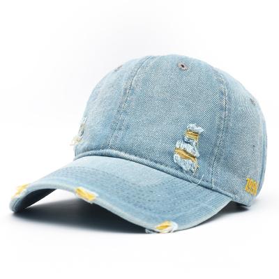 China New 1999 men's and women's casual street hat wholesales denim hole embroidery baseball cap washed by COMMON style for sale