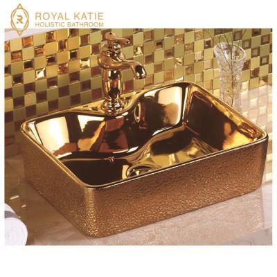 China Ceramic Wash Basin Saudi Arabia Gold Cabinet Bathroom Sink for sale