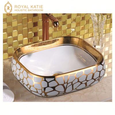 China Wash Basin Top Design Art White Electroplate Bathroom Sinks Gold Ceramic Wash Basin for sale