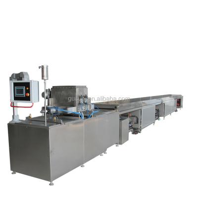 China Snack factory high productivity chocolate chip depositor for chocolate production line price negotiable Te koop