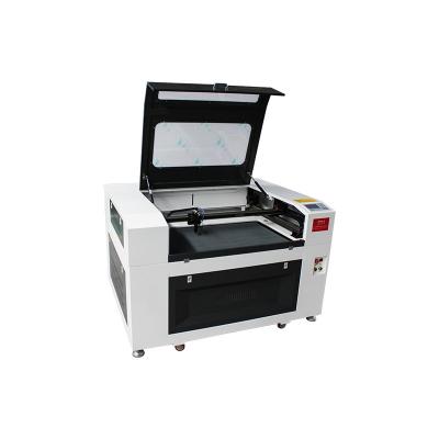 China Multifunctional 9060 100W programmable auto focus cheap laser engraving machine and non-metal laser cutting machine for sale