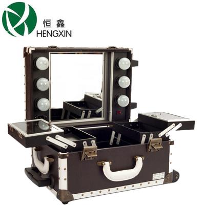 China Retro Style Trolley Lighted Makeup Station Train Case With Mirror And Lights for sale