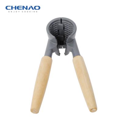 China Stocked Wholesale Kitchen Tools Aluminum Nut Cookie Nut Opener For Home Use for sale