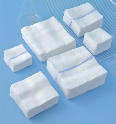 China 100% Medical Cotton Gauze Swab Cutting Absorbent Rolled Care Gauze Compresses Factory Price White Folded Edge for sale