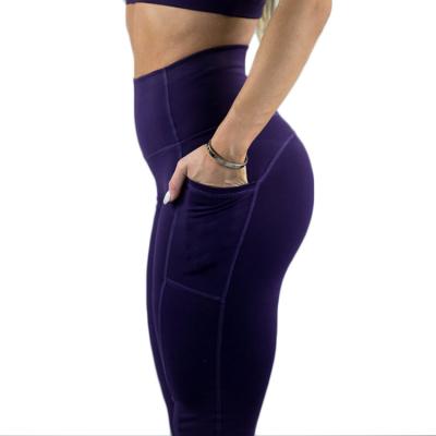 China OEM Antibacterial Women High Waist Gym Sports Workout Fitness Yoga Pants With Phone Pocket for sale