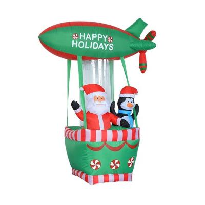 China Christmas High Festival Decoration 180cm Inflatable Santa Claus And Penguin On Air Balloon Hot Inflatable Christmas Santa Penguin Decoration for sale