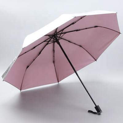 China Minimalist custom fold silver glueuv umbrellas with logo prints for sale