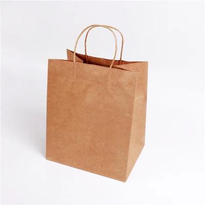 China Latest Design Premium Quality Brown Kraft Durable Small Paper Bags With Printed Logo for sale