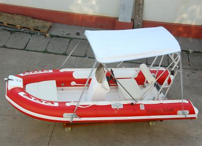 China Rigid Fiberglass 6 Person Inflatable Boat With Sunshade for sale