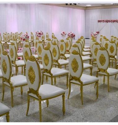 China Hot Sales Luxury Wedding Event Gold Reception Chair Stainless Steel PU Stackable Upholster Dining Chair for sale