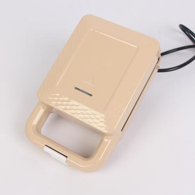 China Household Khaki Mini Electric Breakfast Sandwich Maker With Touch Cool Handle Stop LED Overheat Indicator for sale