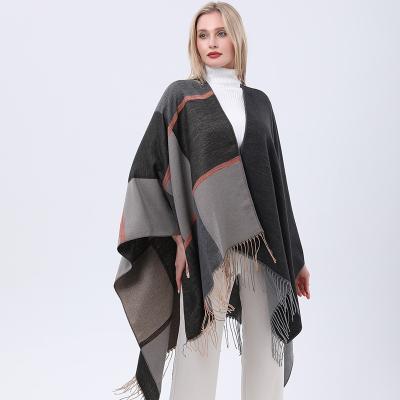 China Decoration European American new lady open jacquard tassel cap poncho sweater poncho 2021 towel for sale