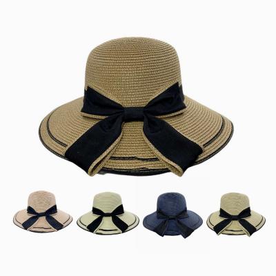 China Black Knot Fisherman Bow Striped Rural Fresh Border Women's Outdoor Straw Hat Travel Paper Umbrella Straw Hat for sale