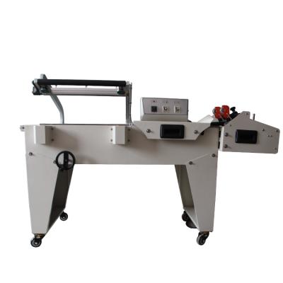 China CLOTHING Factory Hot Sale Horizontal Semi-automatic Stretch Wrapping Machine High Speed ​​Heat Shrink for sale