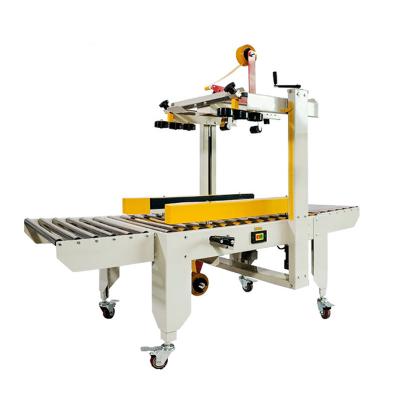 China High Quality Automatic CLOTHING Machine Packing Sealing Carton Sealer for sale