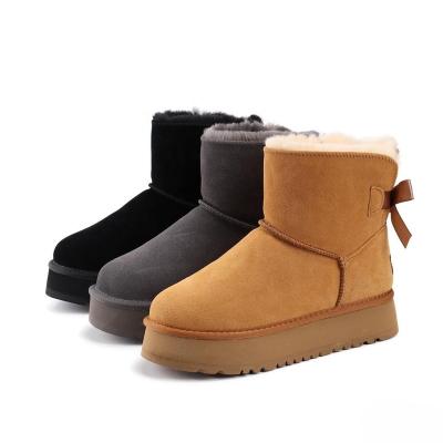 China Fashion Trend Snow boots for women Winter thick soles cotton Plush Shoes Female Bow Knot Waterproof Girrls Flat Shoes for sale