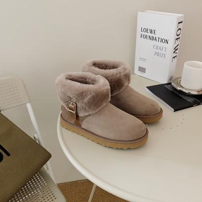 China New Fashion Round Soft Sheepskin Snow Double Face Decoration Leather Strap Black Winter Boots For Women for sale